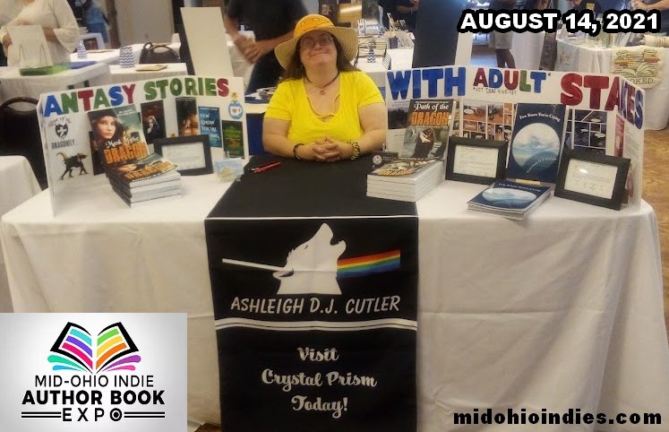 Ashleigh at the Mid-Ohio Indies 2021 with her table of books.